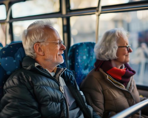 retiree pair on a sightseeing city bus tour retiree pair on a sightseeing city bus tour, created with generative ai